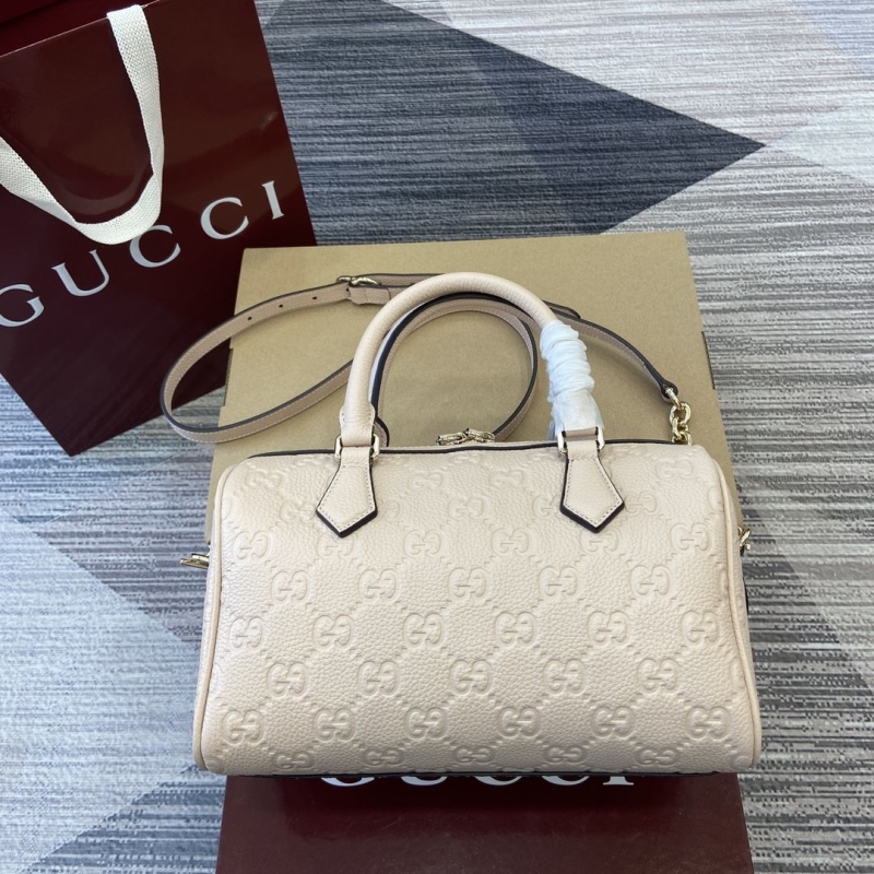 G*u*i top handle bags
